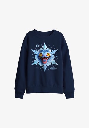 Navy sweatshirt with a large graphic of a blue cat face with yellow eyes, a red tongue sticking out, surrounded by a snowflake design.