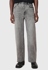 Light gray wide-leg jeans made from denim, featuring a faded texture, belt loops, and traditional five-pocket design.