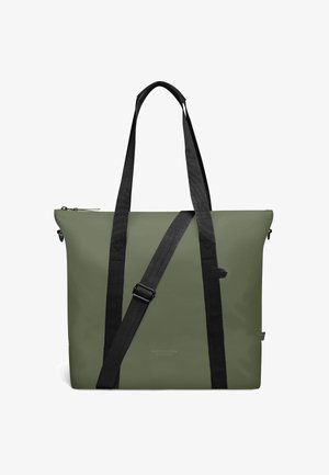 Bolso tote rectangular de color verde oliva con dos largas correas negras para el hombro y una correa cruzada negra ajustable, cierre superior con cremallera.