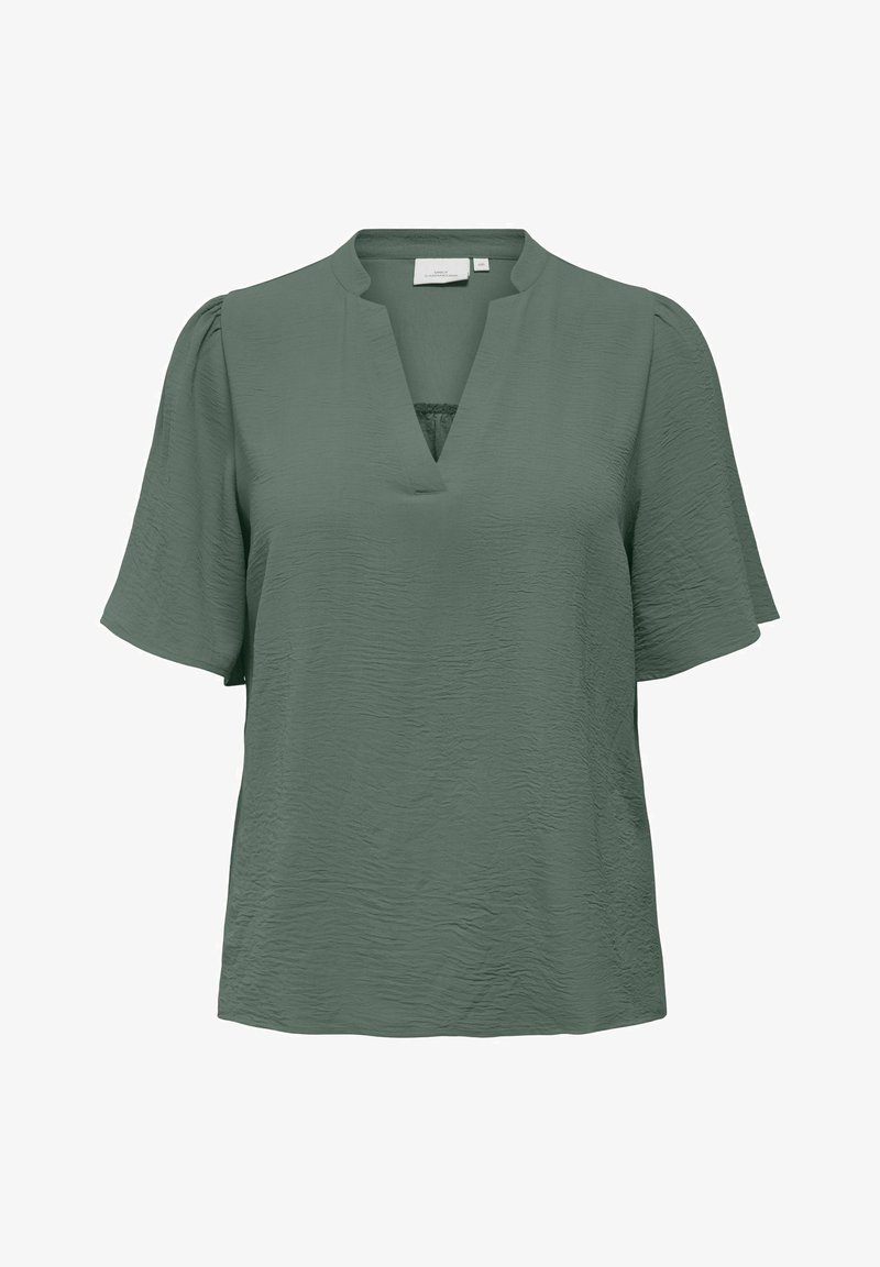 Groene blouse met korte mouwen van gestructureerde stof, V-hals en licht opgeblazen mouwen.
