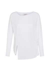 Top bianco a maniche lunghe con una vestibilità ampia, fessura laterale e dettaglio legato regolabile in vita, realizzato in tessuto leggero.