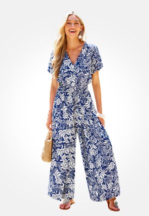 Blauwe en witte bloemen-jumpsuit met een V-hals, korte mouwen en een elastische tailleband; heeft wijde benen en een relaxte pasvorm.