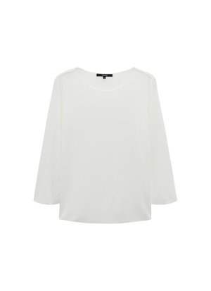 Haut à manches longues blanc fabriqué dans un tissu doux, avec un col rond et une coupe décontractée. Design simple et sans coutures, sans embellissements.