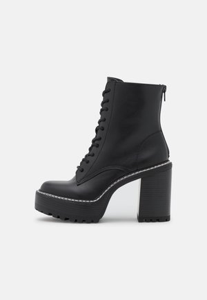 Enkellaarsjes met hoge hak - black