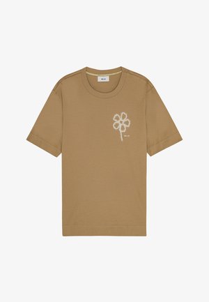 Bruine katoenen t-shirt met korte mouwen en een relaxte pasvorm. Voorzien van een witte geborduurde bloemontwerp en een ronde halslijn.