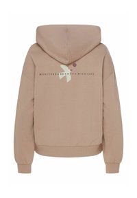 Béžová mikina s kapucí, na zádech má minimalistický bílý obrázek ptáka a kruhu nad nápisem "Mediterranean Sea Wildlife".