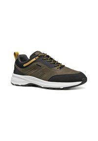 Zapatillas deportivas para hombre fabricadas con materiales de color verde oscuro y negro, con una suela blanca, acabado texturizado, acentos amarillos y cordones redondos.