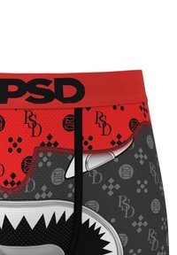 Ceinture élastique rouge avec le logo "PSD" ; corps noir et gris arborant des graphiques de requins et des motifs à pois ; texture de tissu douce.
