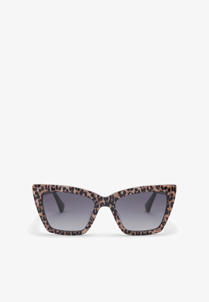 Cat-eye sunglasses with a leopard print pattern, made of plastic. Gradient gray lenses and sharp angular edges; bold design elements emphasize shape.