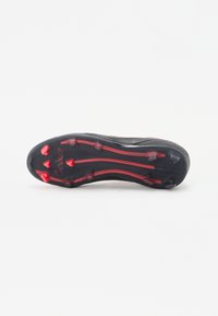 Black football cleat with a textured surface, featuring red accents and six studded spikes on the sole for traction.