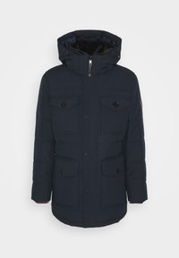 Marinblå vadderad parka med huva, med två bröstfickor, två framfickor och knappdetaljer. Dragkedja fram med foder inuti.