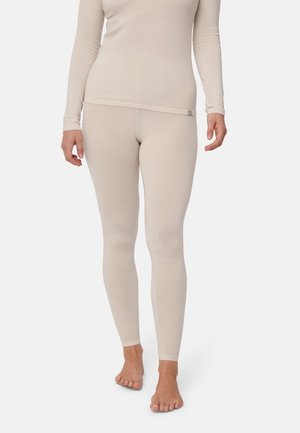 Maglia beige a maniche lunghe e leggings. Realizzati in tessuto morbido e elasticizzato con una superficie liscia. Design aderente, cuciture minime e logo discreto.