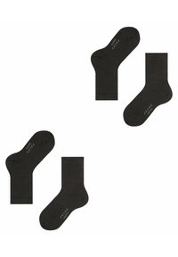 Calcetines de algodón negros con una textura suave y puños acanalados. Presenta un sutil logo en la suela. Largo estándar de media caña.