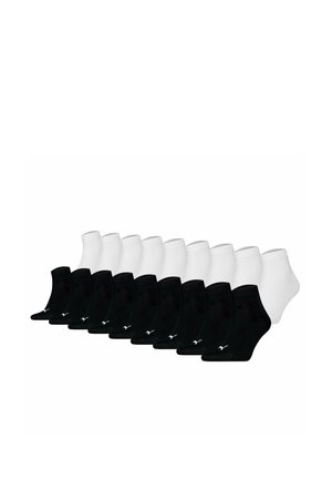 Diez pares de calcetines negros y diez pares de calcetines blancos de corte bajo, dispuestos en dos filas sobre un fondo blanco.