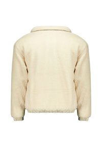 Veste en polaire crème au toucher texturé et doux, dotée d'un col et de poignets élastiques ainsi que d'un ourlet élastique.