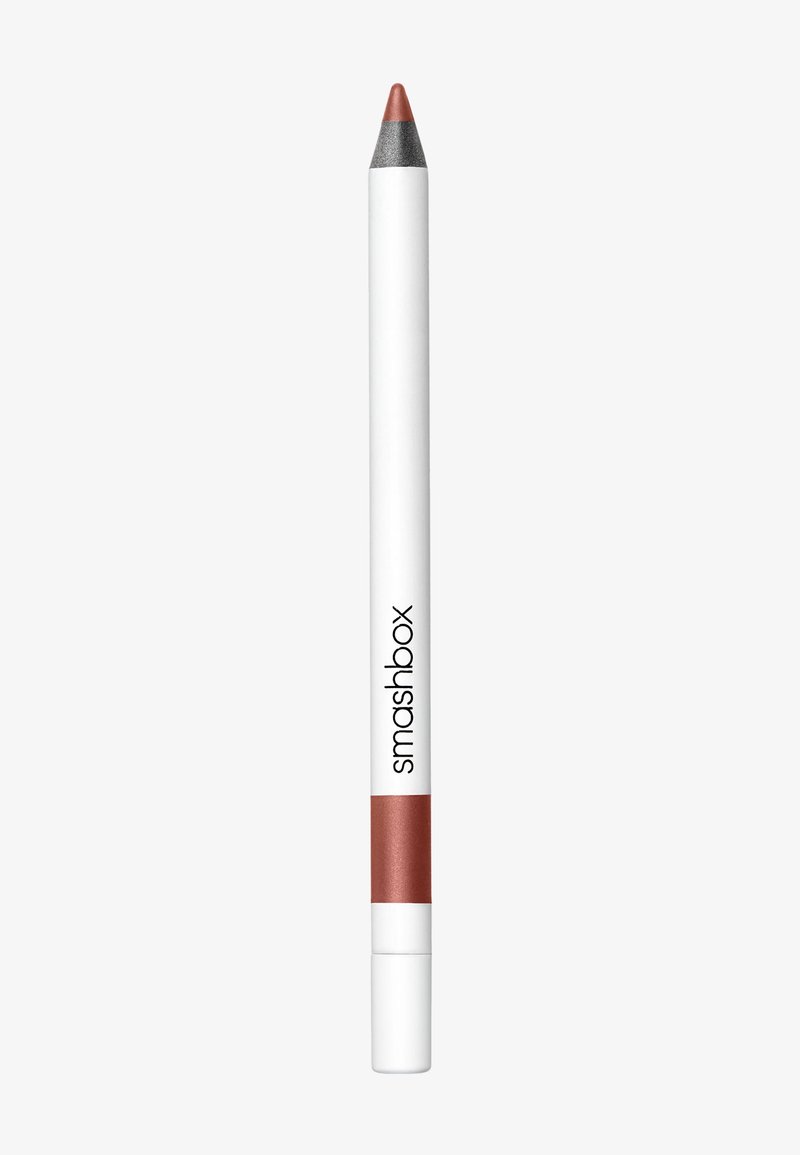 Matita labiale Smashbox con un corpo bianco, punta grigia e una sezione finale color rame. Texture liscia con branding chiaro sul lato.