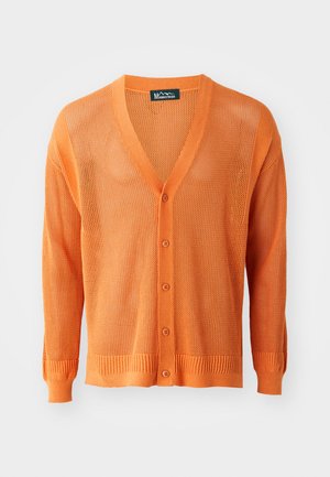 Knitted orange cardigan featuring a V-neck, button front, long sleeves, and ribbed cuffs and hem. The texture is open-weave.