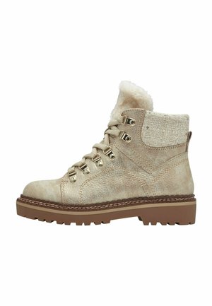 Bottines beige en daim texturé, avec doublure en fausse fourrure, œillets en métal, design à lacets et semelle en caoutchouc robuste.
