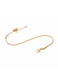 Bracciale in tono oro con un design flessibile e attorcigliato, chiusura a granchio e un pezzo di accento circolare. Finitura liscia e lucida con una texture sottile.