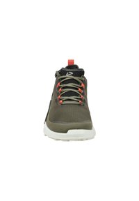 Sport shoe in olive green and black mesh with white sole; features orange laces and a red pull tab at the heel for easy access.