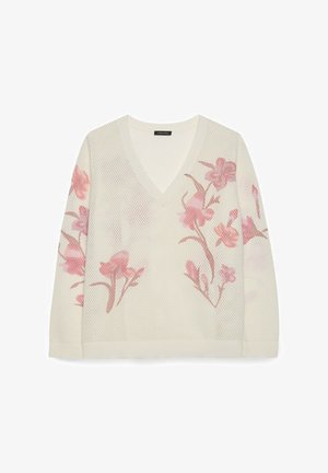 Hvid mesh V-hals sweater med lange ærmer, der har lyserøde blomsterdesigns på front og ærmer.