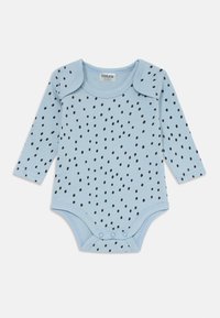 Pitkähihaisessa vauvan bodysuitissa on vaaleansininen puuvilla mustilla pilkuilla, jossa on lap-selkäreunat ja napitus alhaalla.