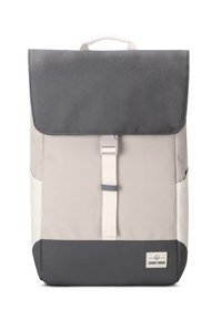 Backpack with a dark gray top flap and light gray body. Features a central strap closure, side pockets, and a square base with a dark gray bottom.