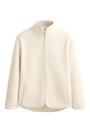 Fleece jack in crèmekleur met een hoge kraag, volledige rits en twee zijzakken. Zachte textuur met een gestructureerd buitenoppervlak.