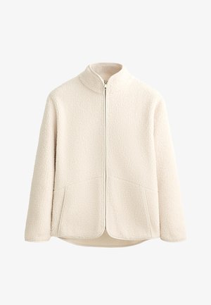 Fleece jacket in cream color with a high collar, full-length zipper, and two side pockets. Soft texture with a textured outer surface.