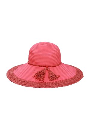 Wide-brimmed pink sun hat with textured weave and two decorative tassels hanging from a braided band around the crown.
