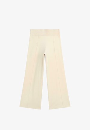 Weite Hose aus einem hellbeigen Stoff, mit einem gerippten Bund, zwei vorderen Nähten und glatter Textur.