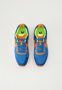 Blue athletic shoes with orange accents, mesh upper, and a bright green interior. Features a textured sole and laces.
