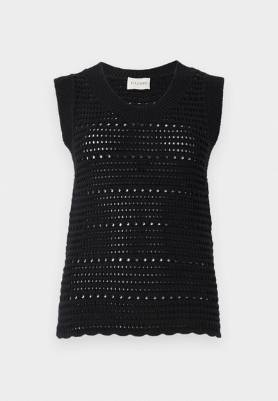 Svart strikket ermeløs topp med teksturert åpnet design, rund hals og bølgekant. Laget av et pustende materiale.