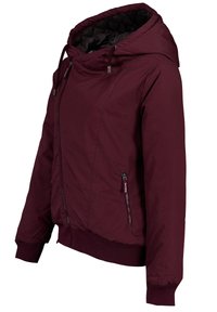Burgundy jacket with a hood, featuring a front zipper, ribbed cuffs, and two side pockets. Textured fabric with a smooth interior lining.