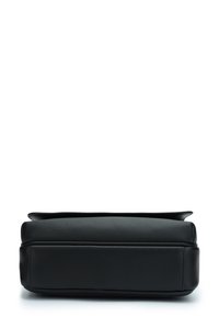 Black leather bag featuring a smooth texture and a slim, rectangular shape with rounded edges and a zippered top closure.