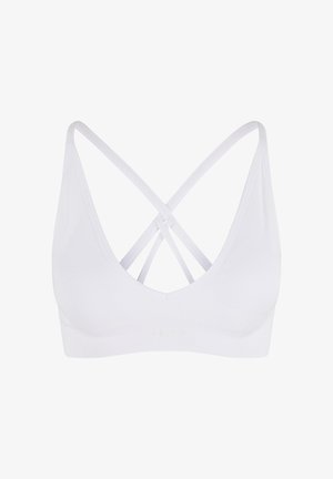 Weißes Bralette mit V-Ausschnitt und gekreuzten Trägern am Rücken. Hergestellt aus weichem Material mit breitem Unterbrustband und ohne sichtbare Hardware.