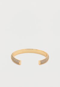 Βραχιόλι μανσέτα σε χρυσό τόνο με υφή στη μπάντα και διακριτικές διαφανείς κρυστάλλινες λεπτομέρειες στη μία πλευρά, με λεία άκρα για εύκολη εφαρμογή.