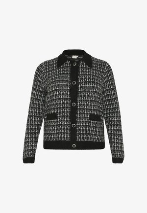 Black and white tweed cardigan with a collar, button front, and two patch pockets. Textured pattern with contrasting trim and large buttons.