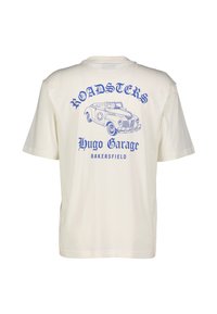 Cream cotton t-shirt featuring blue graphic text "ROADSTERS" and a vintage car illustration, with "Hugo Garage" and "BAKERSFIELD" below.