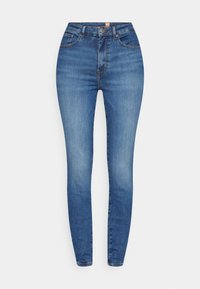 Skinny jeans made of medium blue denim, featuring a high waist, five pockets, and subtle fading effects on the front and back.