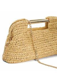 Woven straw handbag in light yellow with a gold-tone metal handle and chain strap, featuring a structured shape and textured surface.