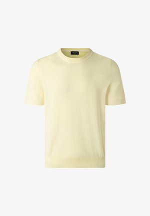 Maglione a maniche corte di colore giallo pallido con scollo rotondo, collo, polsini e orlo a coste, mostrato su uno sfondo bianco.