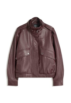 Dark maroon leather jacket with high collar, front snap-button pockets, zipper, and belt buckle closure at collar, laid flat on white background.