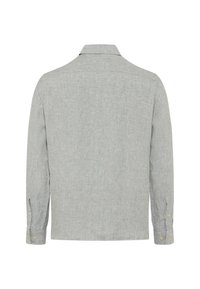 Light gray long-sleeve shirt made from textured fabric, featuring a classic collar and buttoned cuffs, with a plain design and no patterns.