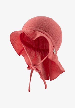 Coral-colored cotton sun hat with a soft texture, wide brim, adjustable chin ties, and gathered interior for secure fit.