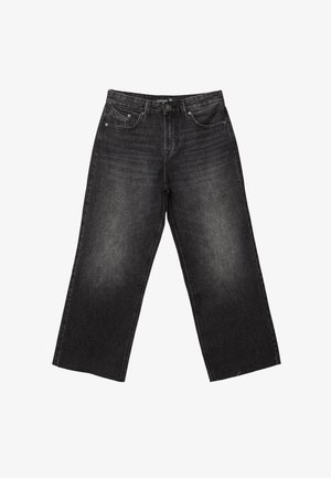 Jeans en denim noir à jambes larges avec une taille haute, quatre poches et des détails délavés pour un look usé. Couture classique sur l'ensemble.