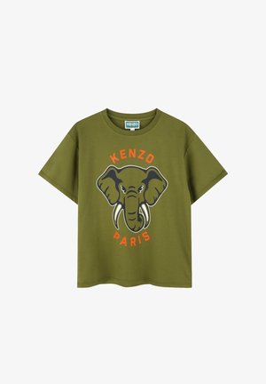 T-shirt à manches courtes vert olive arborant un graphique de tête d'éléphant avec des précieuses et le texte « KENZO PARIS » en orange.