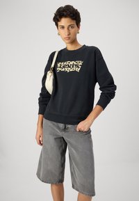 Levi's® GRAPHIC STANDARD CREW - Mikina - black