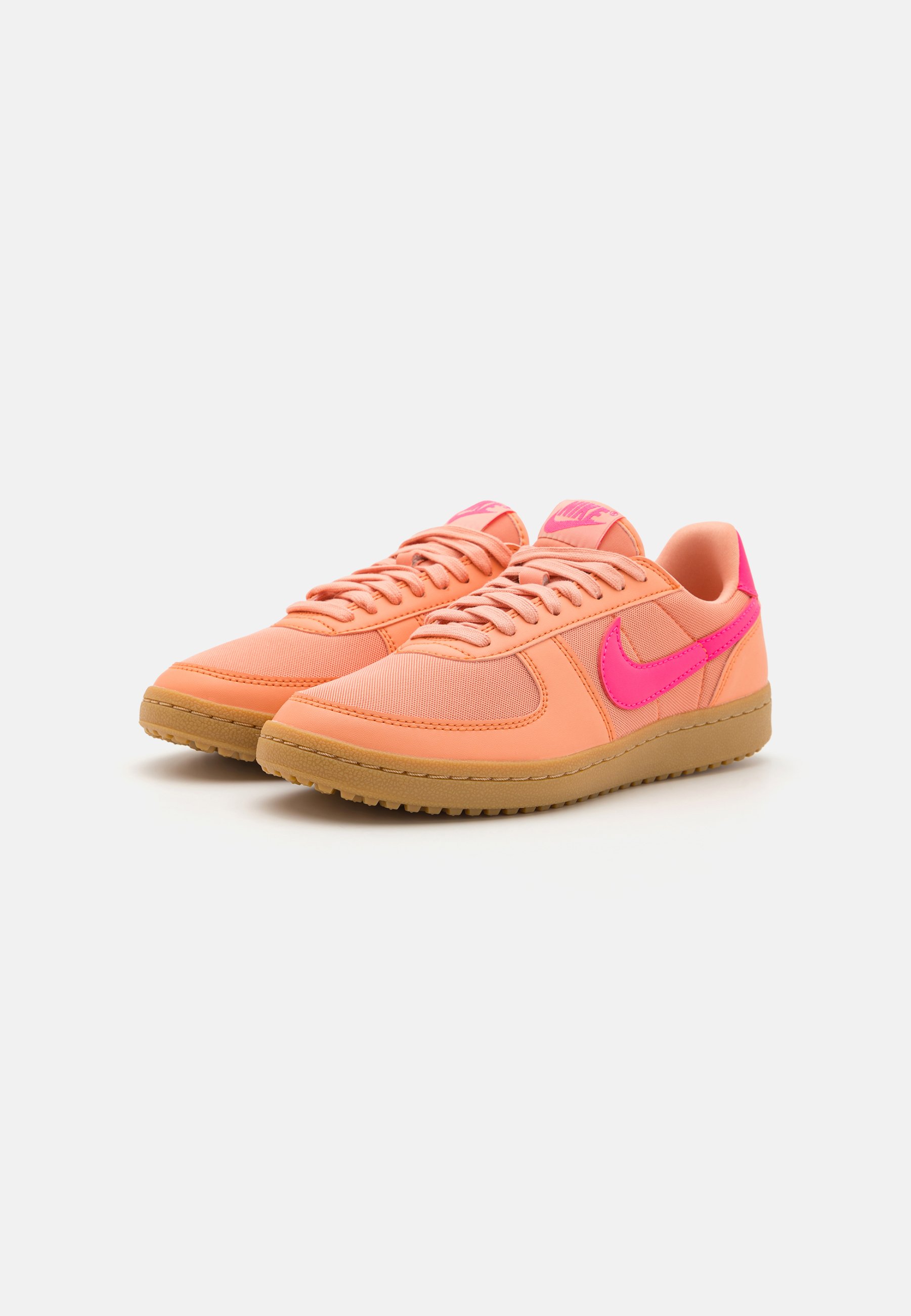 pink white and orange nike shoes