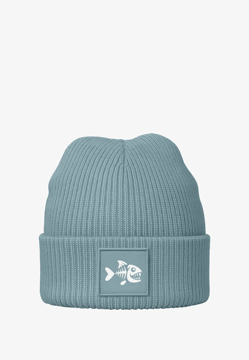 Light blue knitted beanie hat with a ribbed texture and a stitched patch featuring a white fish skeleton design on the front.